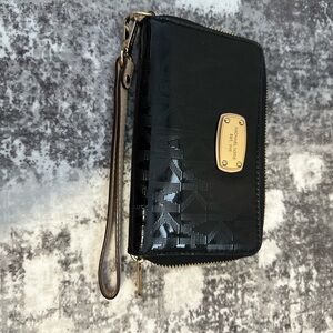 3 Wristlets ( 1 Michael Kors & 2 Coach